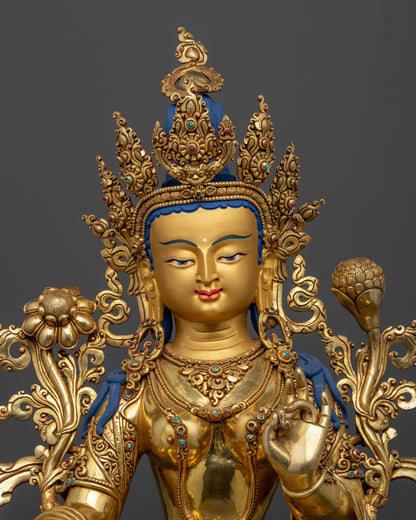 Close up view of  Green Tara face with five-jeweled crown, semi-precious stones, handcrafted Himalayan sculpture