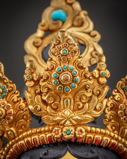 Close up view of Green Tara jewelry including crown and chest ornaments

