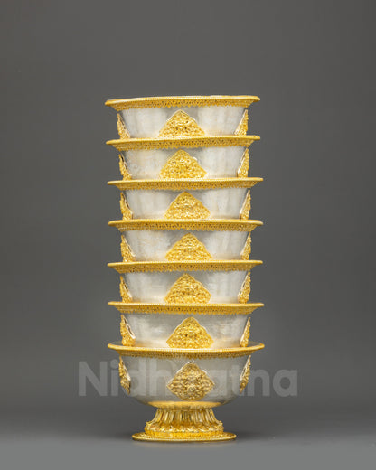 Close up water offering bowl detail, gold silver plated copper, Newari craftsmanship