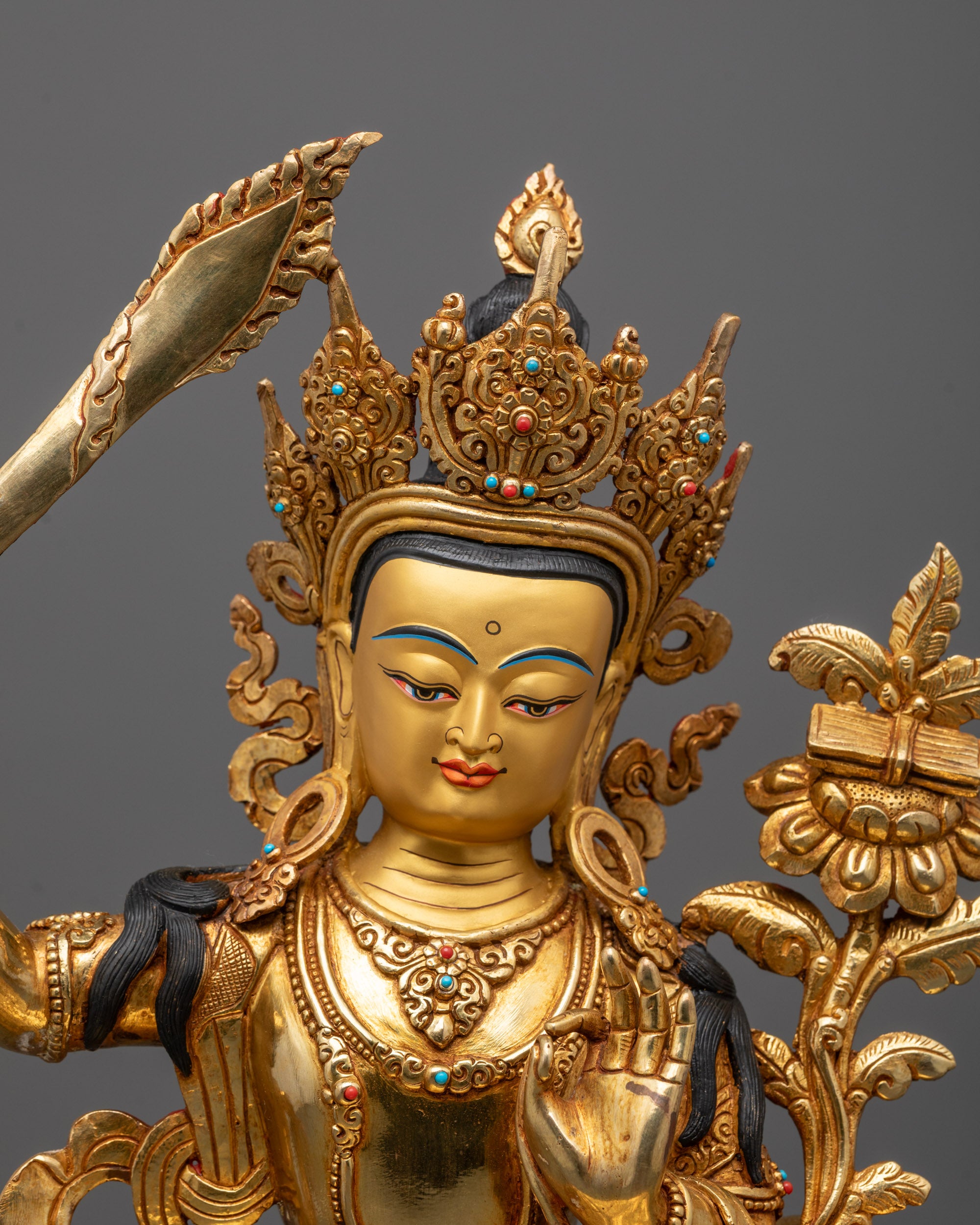 Close view of the Manjushri Statue with her facial expression