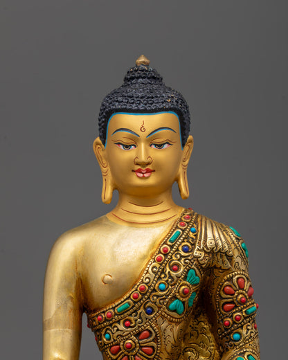 Closeup of Buddha Shakyamuni statue’s 24K gold face and intricate carvings, Patan craftsmanship