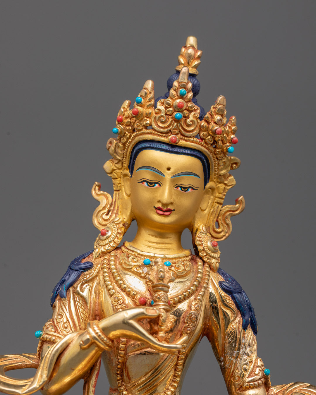 Closeup of Dorje Sempa statue’s intricate carvings and semi-precious stone details