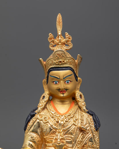 Closeup of Guru Padmasambhava Sculpture showing intricate crown and jewelry details