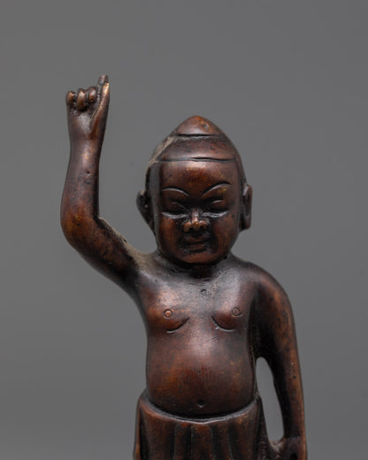 Closeup of intricate carvings on oxidized copper Little Buddha Statue handcrafted in Patan