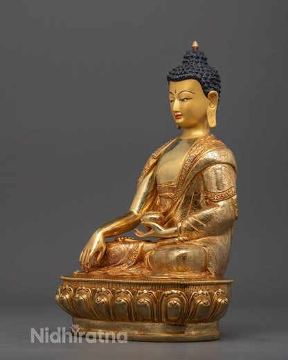 Colorful Shakyamuni Buddha sculpture seated in meditation posture on lotus throne, hand-painted with acrylic colors by Nepalese artisans.