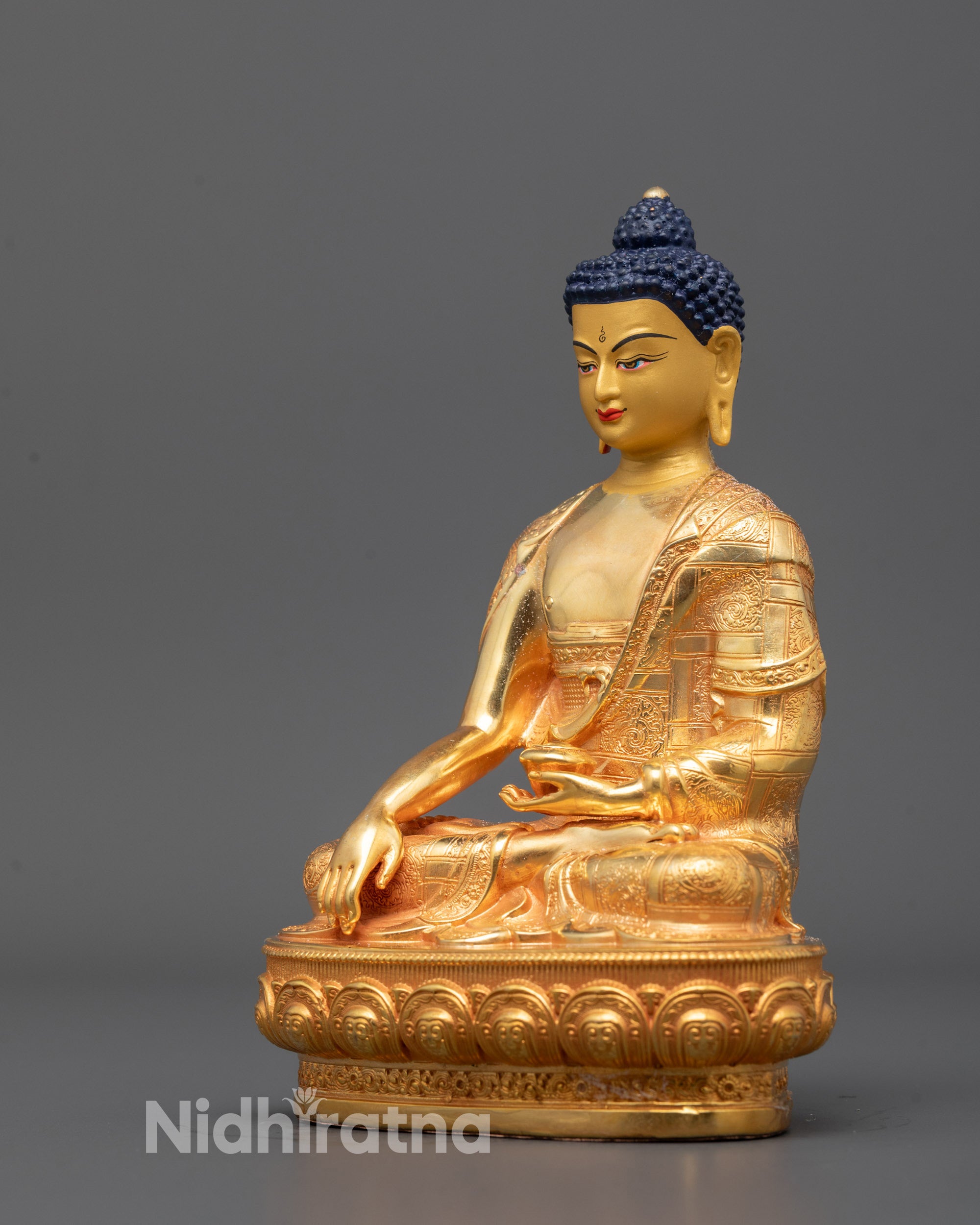 Complete view of the Shakyamuni Buddha Statue placed in a spiritual altar setting