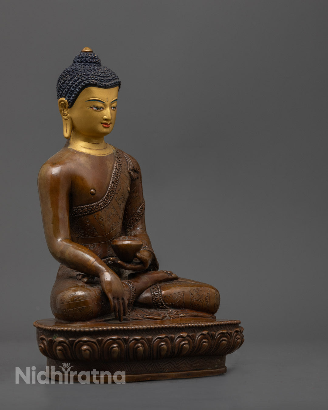 Consecrated hollow chamber at base of Buddha statue for storing mantras or relics, following Buddhist traditions