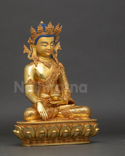 Crowned Buddha Shakyamuni seated on lotus holding patra bowl bhumisparsa mudra
