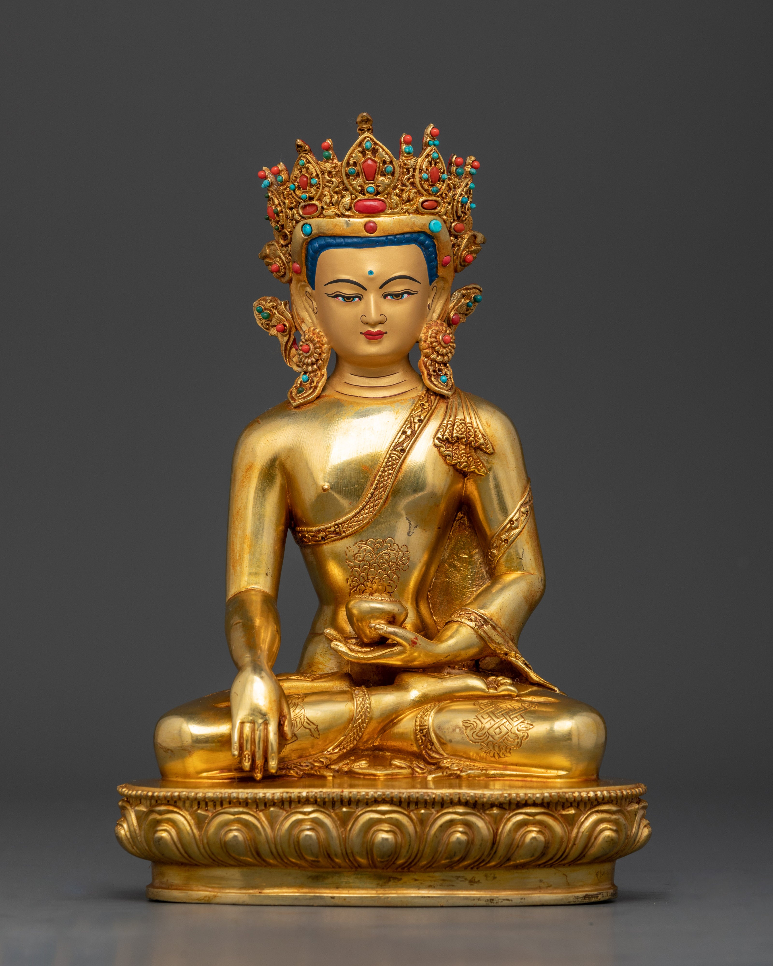 Crowned Shakyamuni Buddha statue handcrafted by Newar artisan, gold fire-gilded with 24K gold face