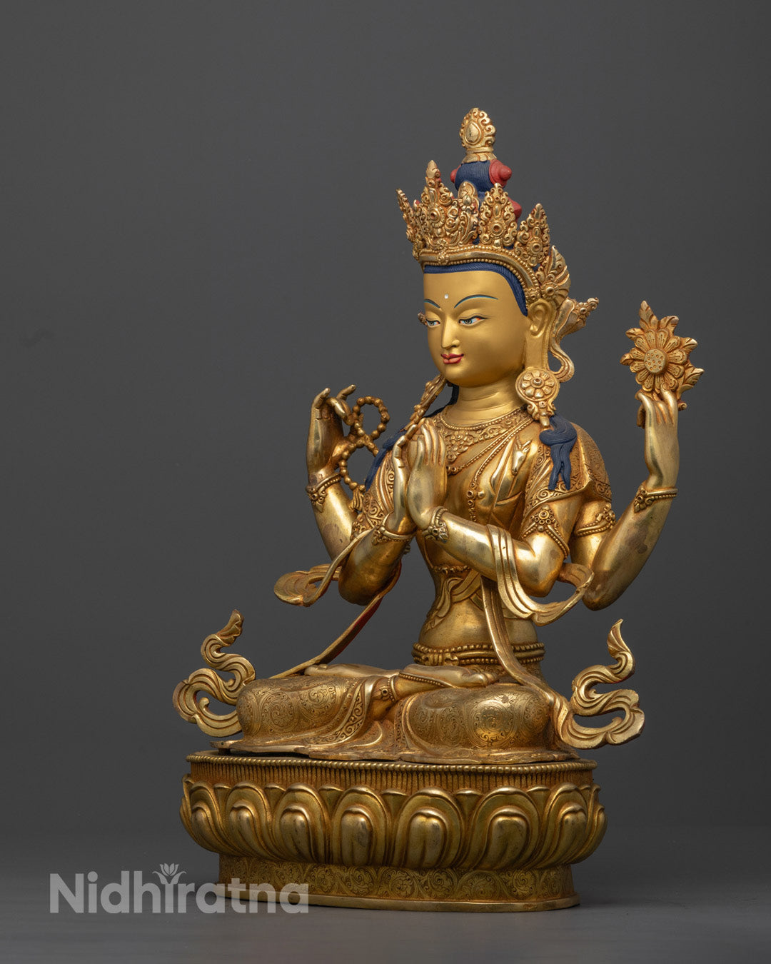 Crystal rosary and wish-fulfilling gem on Handmade Chenrezig Statue, symbolizing mantra recitation and the granting of spiritual and worldly aspirations.