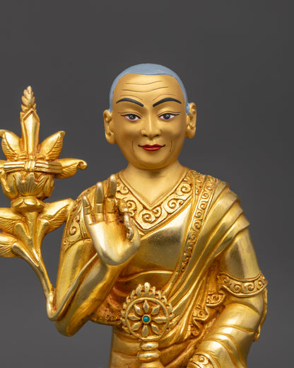 Dalai Lama Sculpture with Dharma Wheel and Utpala Flower Crafted in Lost Wax Technique from Nepal