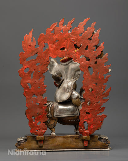 Damchen Garwa Nagpo statue back view detailed craftsmanship copper body armor and ritual design