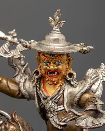 Damchen Garwa Nagpo statue close up handcrafted copper silver details Tibetan guardian sculpture