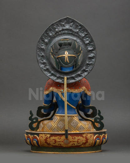 Dark Blue Vajradhara Statue back view highlighting floral halo and robe