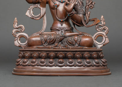 Detail of flowing robes and lotus base, handcrafted Nepalese Manjushri meditation statue