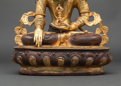 Detail of flowing robes and lotus base, handmade Nepalese Mitrugpa Buddha for devotion and blessings