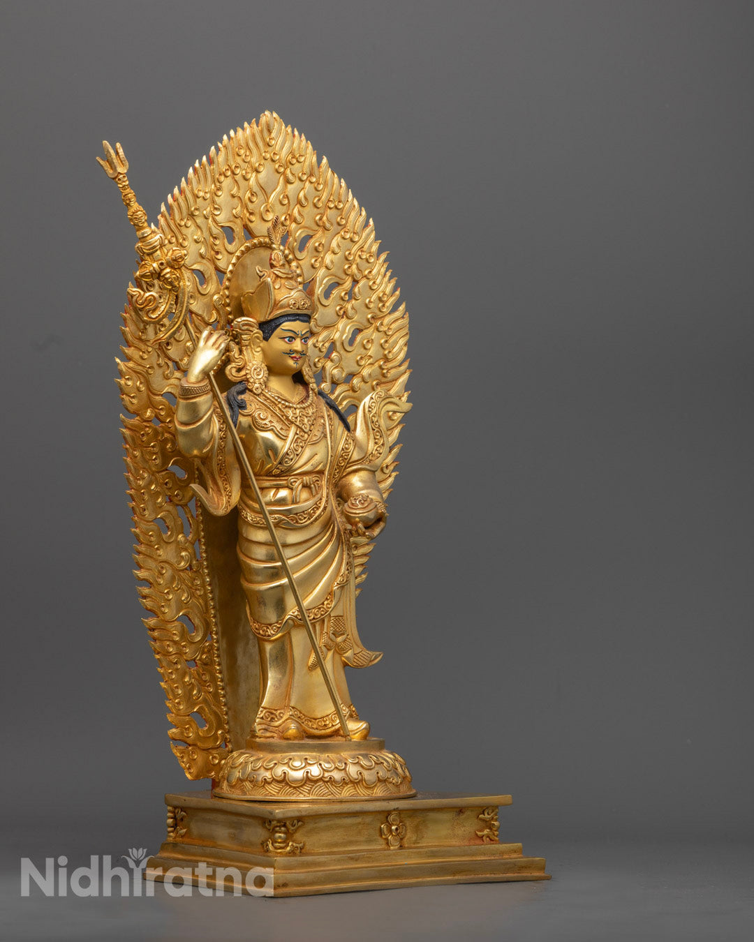 Detail of traditionally crafted Padmasambhava with Disciple using ancient lost wax method by skilled artisan – sacred Tibetan spiritual sculpture.