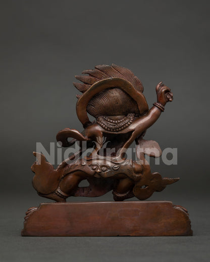 Detailed Vajrapani statue back view showcasing lotus pedestal and traditional Newari craftsmanship.