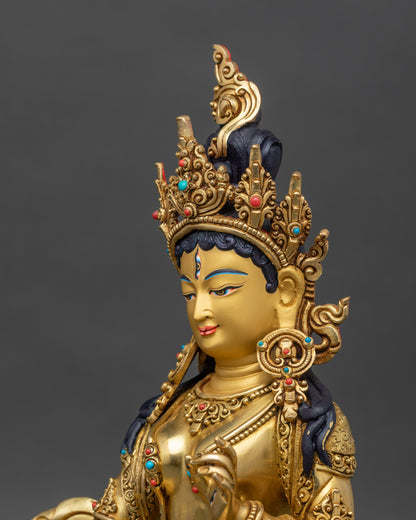 Detailed side close-up of Dukar statue highlighting parasol and seated posture