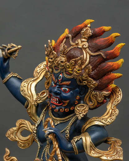 Detailed close-up of Vajrapani face, wrathful expression with hand-painted blue and gold