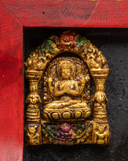Detailed Chenrezig carved on edge of Green Tara wooden frame