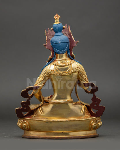 Detailed Himalayan Vajrasattva sculpture with fire gilding and lotus base