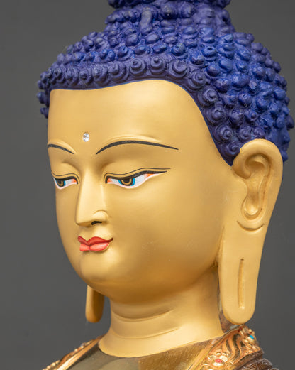 Side close-up of Buddha face, serene expression, gold fire-gilded details
