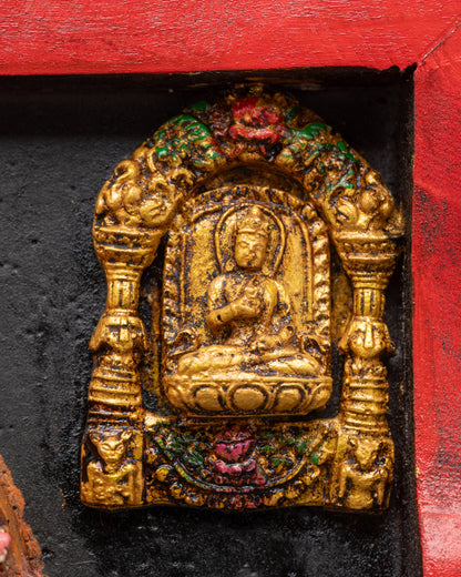 Detailed Vajrasattva carved on edge of Green Tara wooden frame