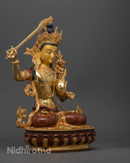 Detailed carving on the robe and jewelry of the Manjushri Bodhisattva statue.