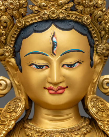 Detailed close-up face of White Tara Bodhisattva, serene 24K gold-painted expression