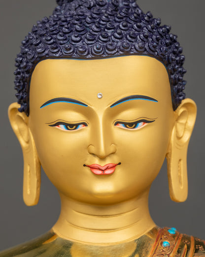 Detailed close-up of Buddha’s calm gold-gilded face with serene expression and floral halo