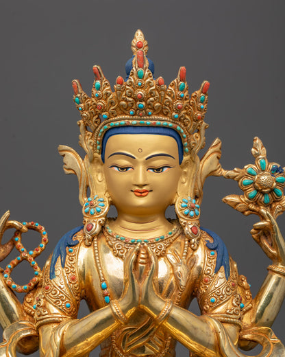 Detailed close-up of Chenrezig Buddha statue showing serene face