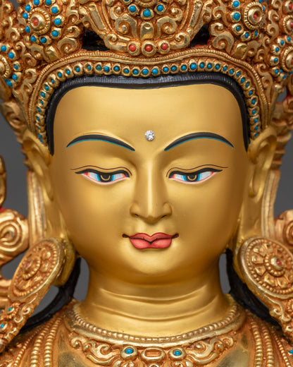 Detailed close-up of Manjushri face, serene expression, gold fire-gilded