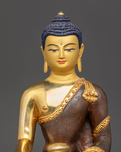 Detailed close-up of Shakyamuni Buddha face with gold paint and Acrylic Colors finish