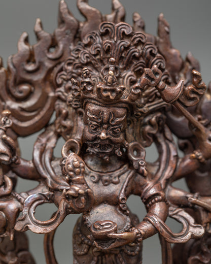 Detailed close-up of White Mahakala Statue face and halo showcasing wrathful protector features