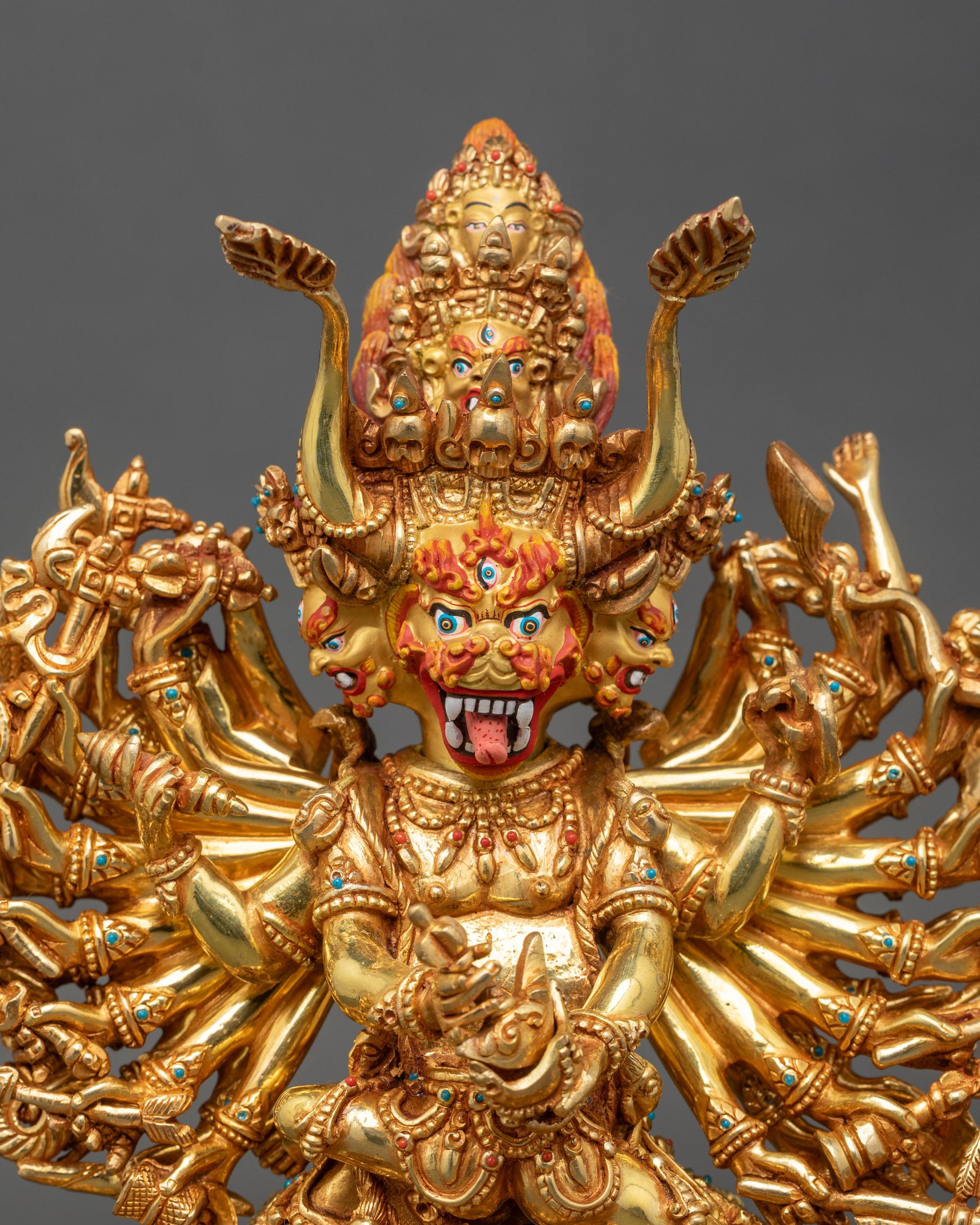 Detailed close-up of Yamantaka’s face showing 9 expressive faces and Newari craftsmanship