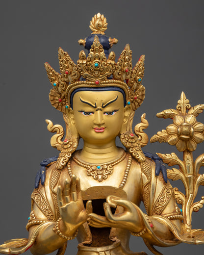 Detailed close up Buddha face gold gilded crown with semi precious stones