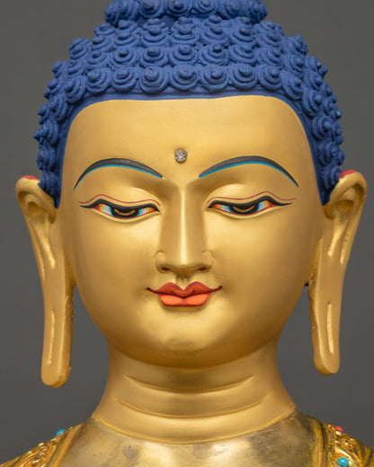 Detailed close up face of Shakyamuni Buddha Sculpture highlighting serene expression