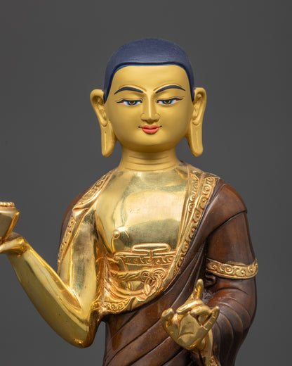 Detailed close up face of Shariputra disciple with refined Himalayan carving
