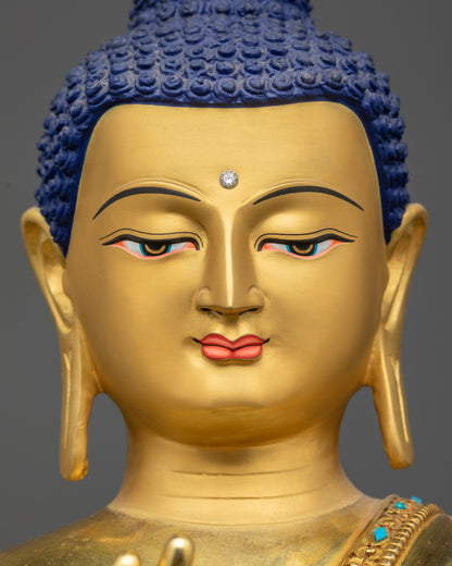 Detailed close up face of Vairocana Buddha gold-gilded serene expression