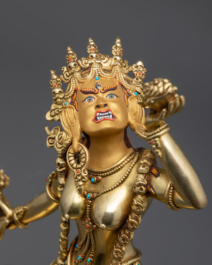 Detailed close up face of Vajrayogini with third eye and five-skull crown