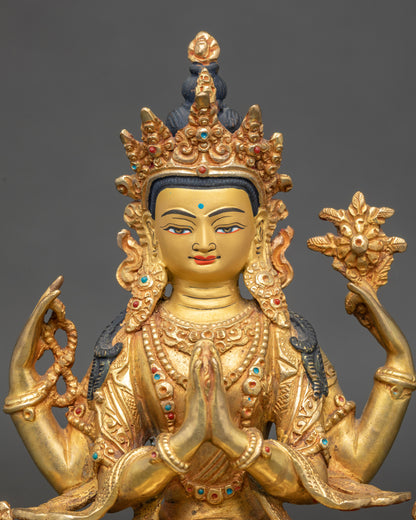 Detailed close up of Chenrezig Buddha face with 24K gold and serene expression