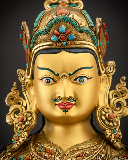 Detailed close up of Guru Rinpoche face showing serene yet wrathful expression
