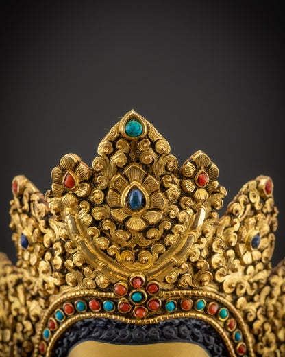 Detailed close up of five-jeweled crown on handcrafted Jowo Rinpoche Buddha
Statue