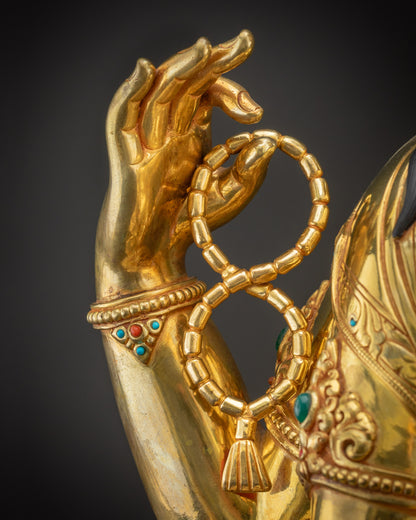 Detailed crystal rosary in Chenrezig Statue symbolizing mindfulness and devotion
