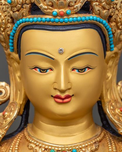 Detailed face close-up of Four-Armed Chenrezig, radiant gold-painted expression