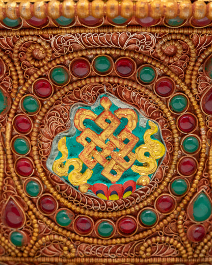Detailed filigree design on Tibetan copper water bowls symbolizing purity and prosperity