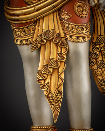 Detailed garments close up showing gold-gilded patterns and hand-painted motifs