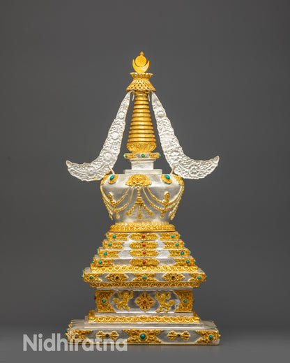 Detailed gold-plated motifs and filigree work on Tibetan Buddhist Stupa