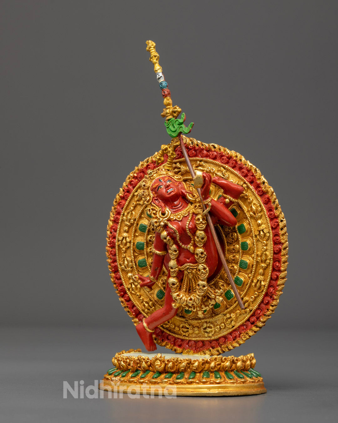 Detailed image of Flying Vajrayogini statue’s hollow chamber for auspicious mantras, adorned with colorful acrylic paint.